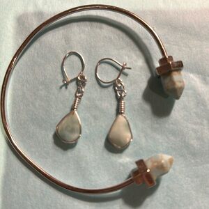 Silver bracelet and earrings set with light turquoise stones